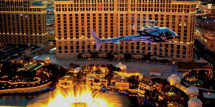 an image of a helicopter flying above Vegas